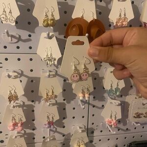 Pink smiley face earrings